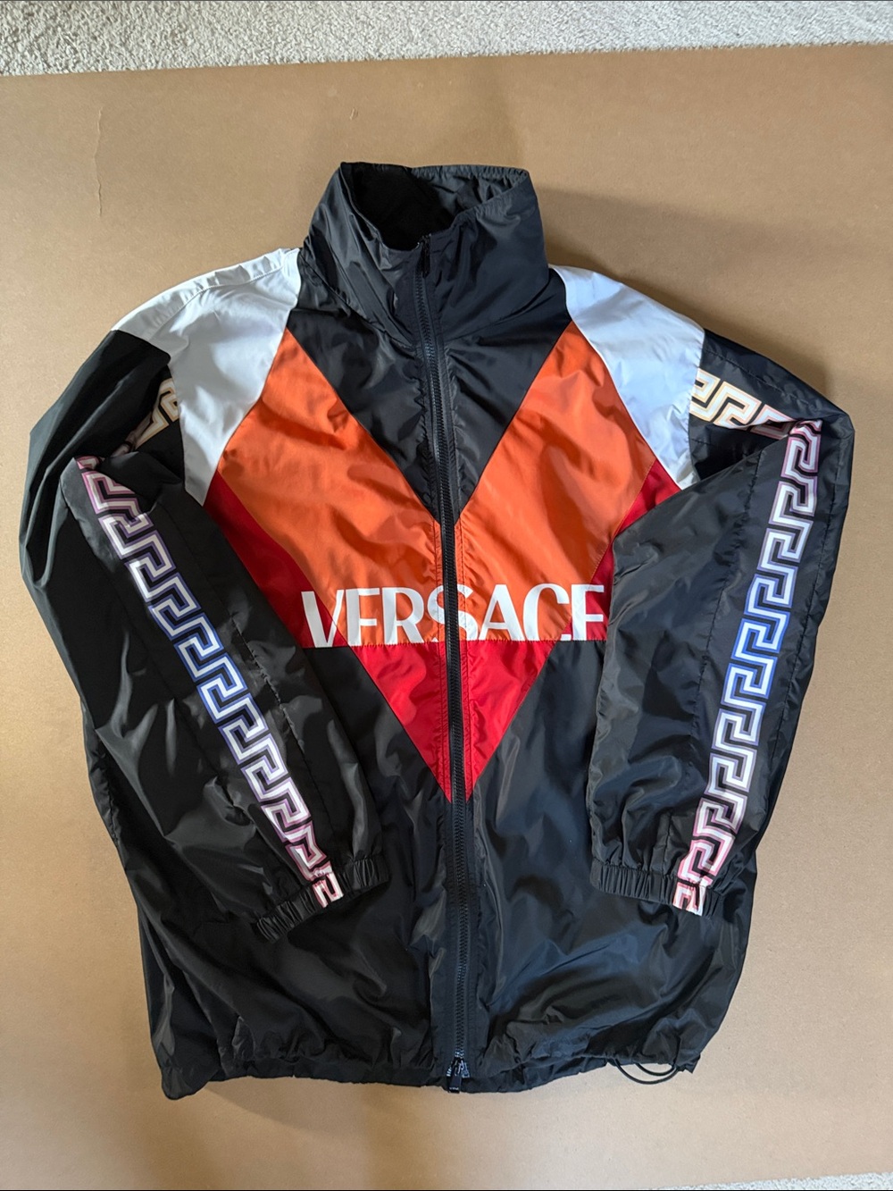 Versace Black Windbreaker with Orange and Red Chevron Panels with Packable Hood